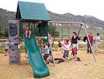A Children's playground offers activity for the very young.
