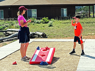 Two players calculating their score after their pitches.