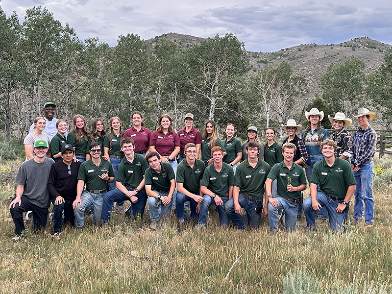 An outdoor scenic group photo of the Reid Ranch employees during the summer of 2026.